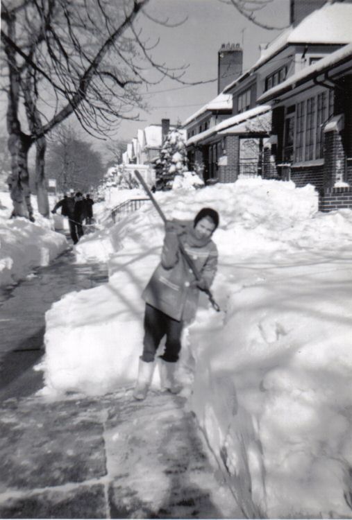 Bonnie shoveling snow 1961